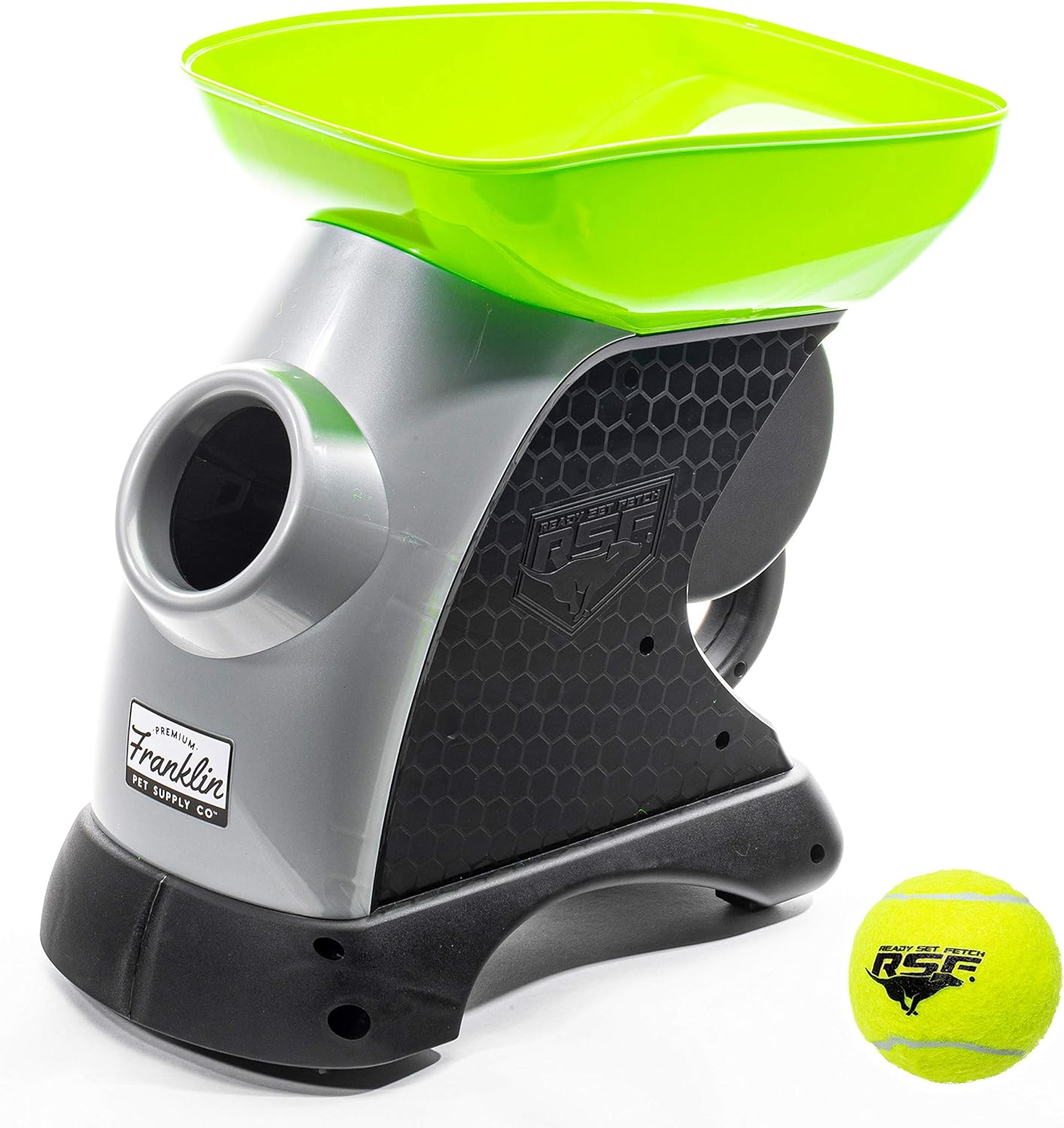 Dog toy thrower with a green top and gray body, accompanied by two balls on a white background.