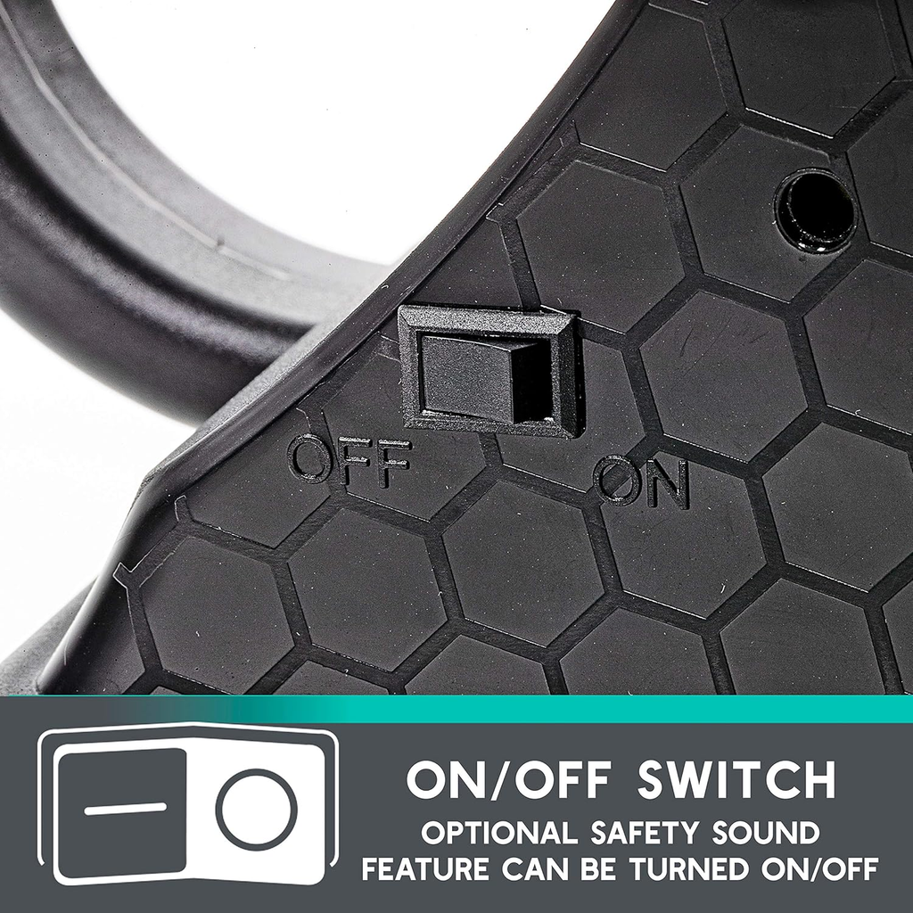 Close-up of a black on/off switch with hexagonal pattern, featuring text and icon indicating safety sound feature.